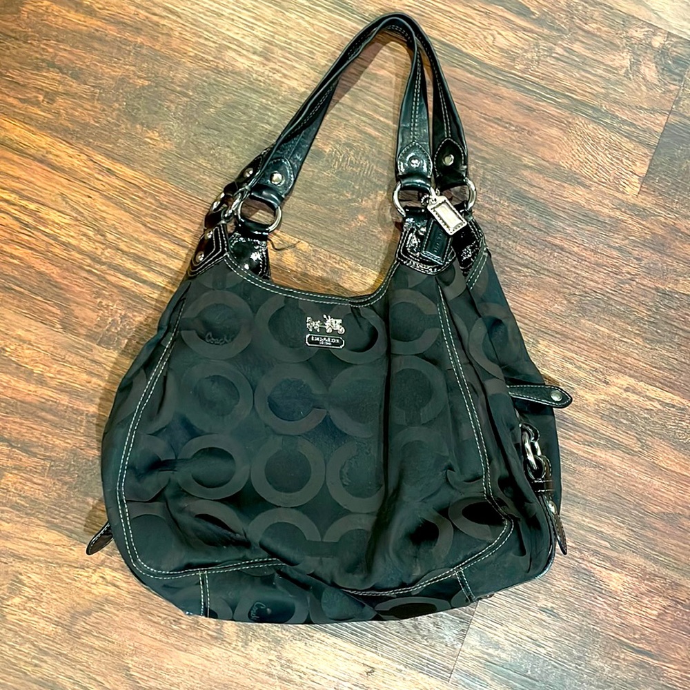 Black authentic coach bag. Madison Maggie op art. Serial number M0973-14305.
